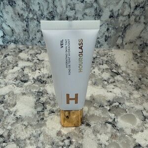 Hourglass Veil Skin Tint in White and Gold
